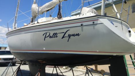 "Patti Lynn" boat name installed on side of hull at Salt Creek St Petersburg