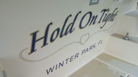 Coast Guard registered boat name installed on Island Packet 485 sailboat Sugar Scoop transom