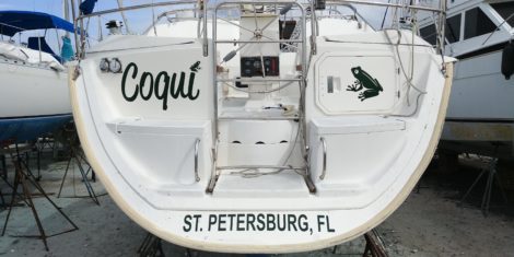 Coast Guard Registration boat lettering installed on Sugar Scoop Hull in Salt Creek St Petersburg