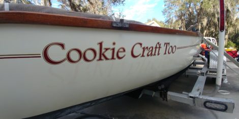 Custom vinyl lettering on small sailboat in Saint Petersburg FL