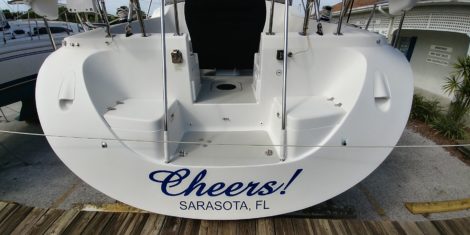 Sugar scoop Coast Guard documented sailboat lettering installed in Sarasota FL