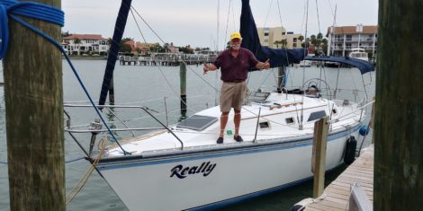 Vinyl sailboat name installed on bow in Tierra Verde FL