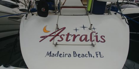 Custom vinyl boat name installed at Embree Marine in St. Petersburg