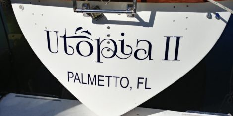 Custom vinyl boat lettering installed in Palmetto FL