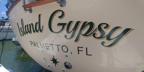 Coast Guard registered vinyl boat name installed at Regatta Point Marina in Palmetto Florida